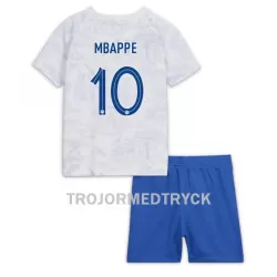 Frankrike Kylian Mbappé 10 VM 2022 Fotbollströja Barn Borta Frankrike Kylian Mbappé 10 VM 2022 Fotbollströja Barn Borta